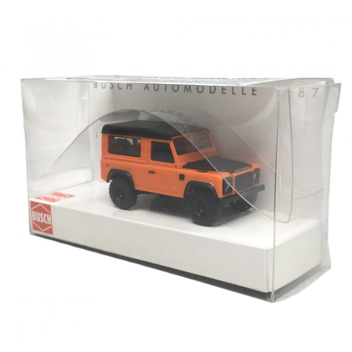 Land Rover Defender 90, dernière édition, Orange - BUSCH 54309 - HO 1/87